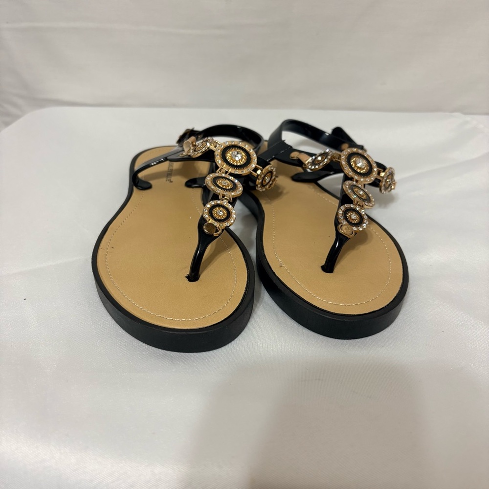 Ashley Blue t-strap sandals design embellished gold and rhinestone details
